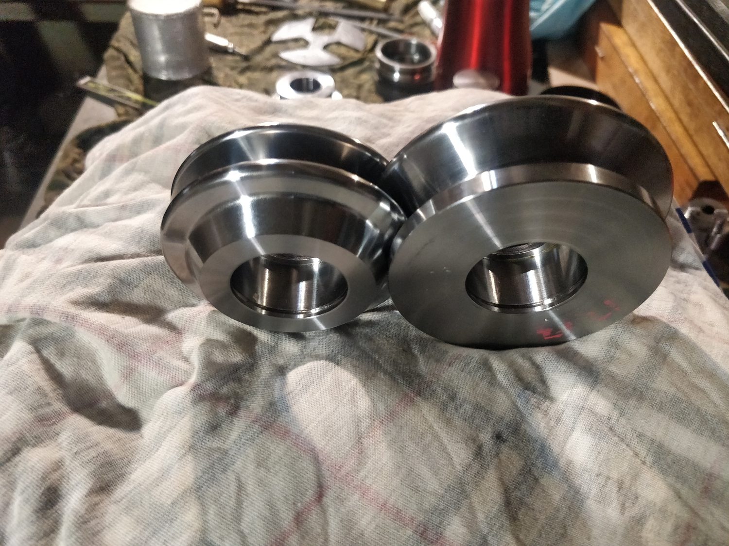 Two precision flanged discs